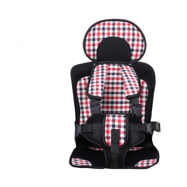 Child car seat with red, white, and black plaid pattern and safety harness straps