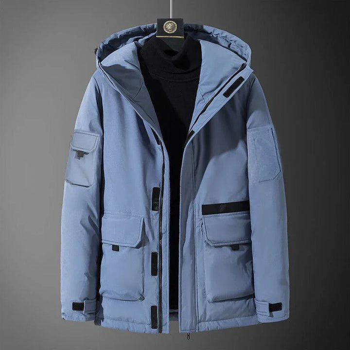 Light blue hooded winter jacket with multiple front pockets and black accents on a mannequin