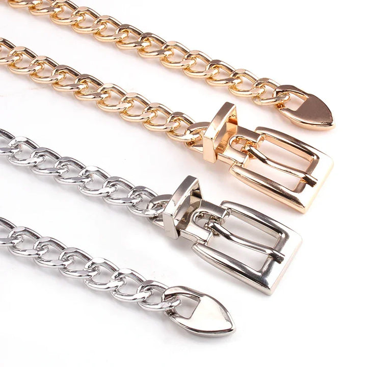 Gold and silver metal chain belts with rectangular buckle closures on a white background