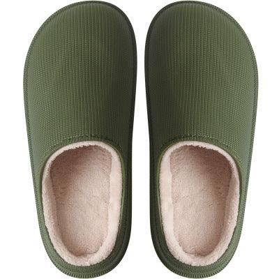 Top view of cozy olive green indoor slippers with soft beige fleece lining