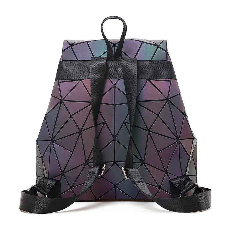 Geometric patterned backpack with iridescent purple and black triangular design and adjustable straps