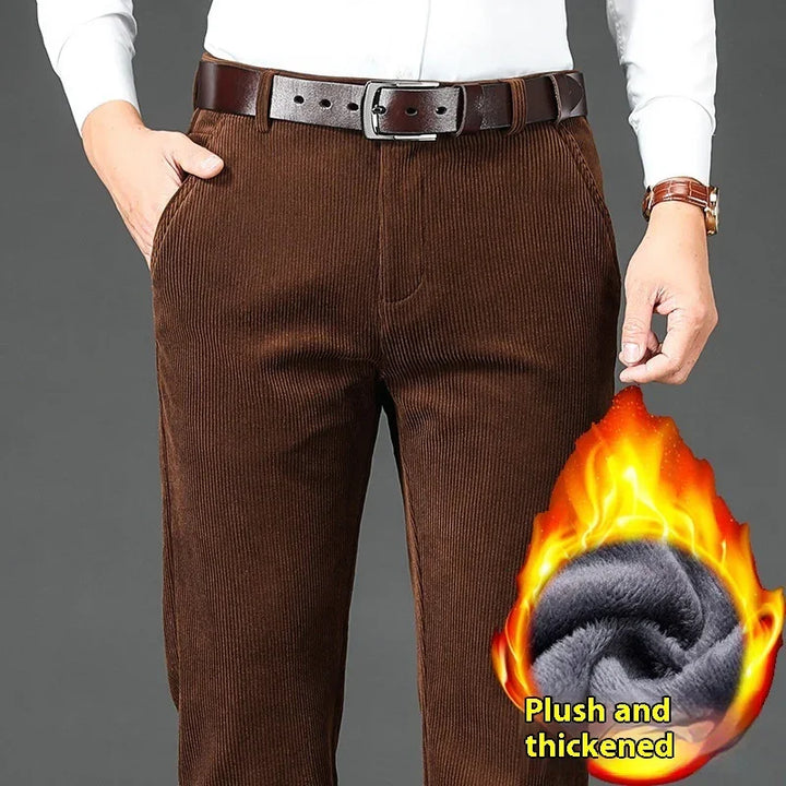 Man wearing brown corduroy pants with a leather belt, white shirt, and watch, plush thickened fabric