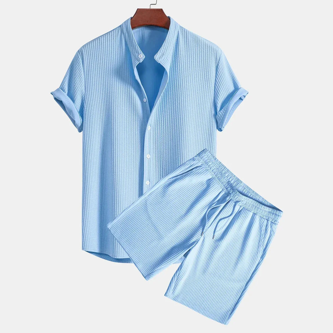 Light blue casual knit short sleeve shirt with button front and matching elastic waist shorts set