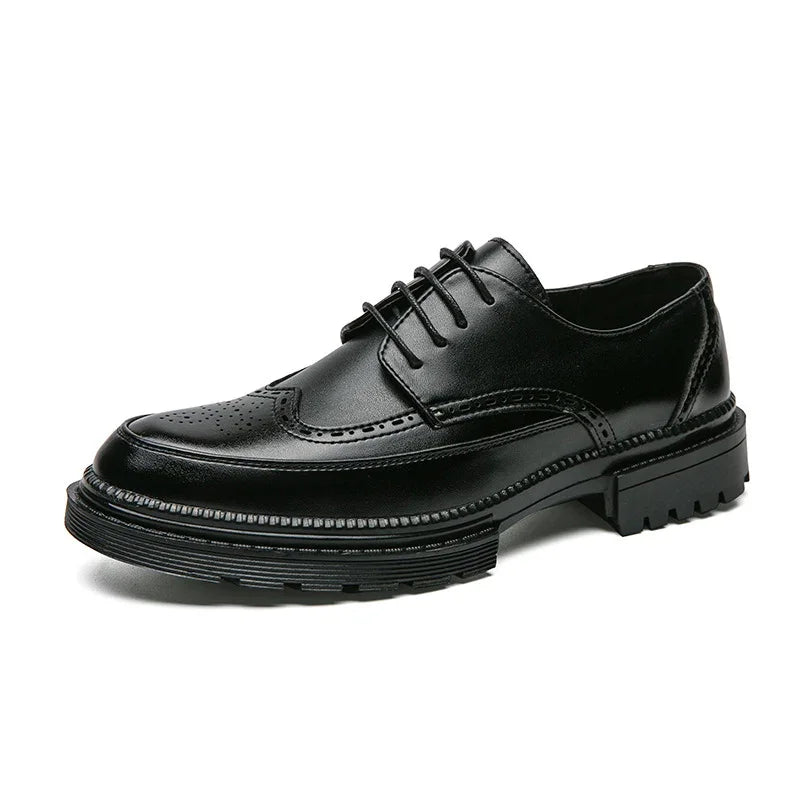 Black leather men's brogue dress shoe with wingtip design and thick lug sole