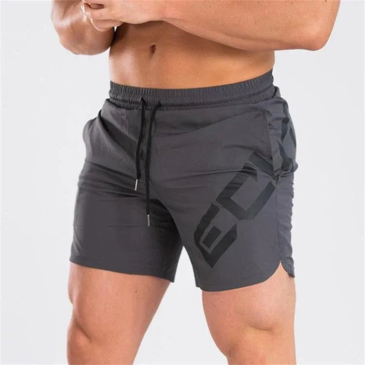 Gray men's athletic shorts with drawstring and bold geometric print on thigh