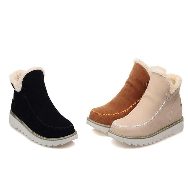Three pairs of cozy winter boots in black, brown, and beige with white fleece lining and thick rubber soles