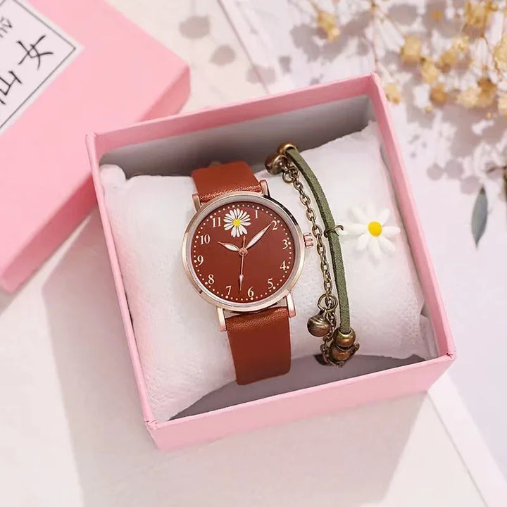 Brown leather strap watch with daisy dial and matching bracelet in pink gift box