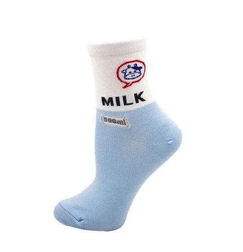 White and light blue ankle sock with cartoon cow, speech bubble, MILK text, and 500ml label design