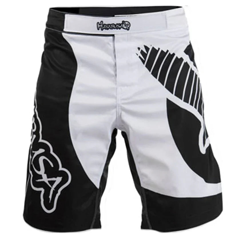 Black and white Hayabusa fight shorts with bold graphic patterns, front view