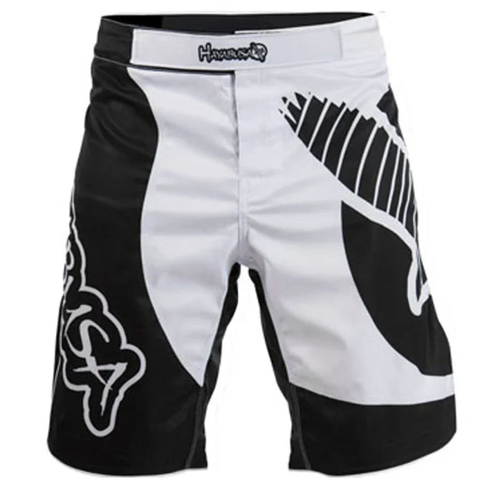 Black and white Hayabusa fight shorts with bold graphic patterns, front view