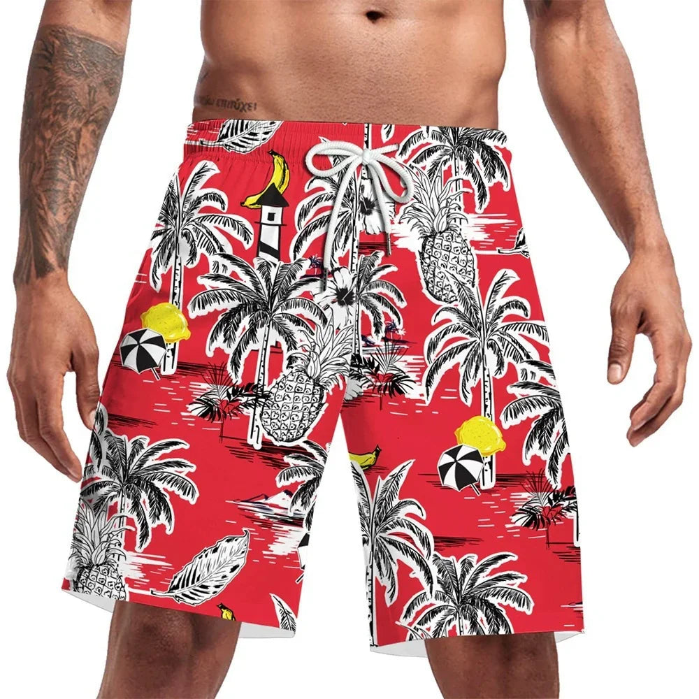 Men's red tropical swim shorts with palm trees, pineapples, bananas, and beach umbrella patterns