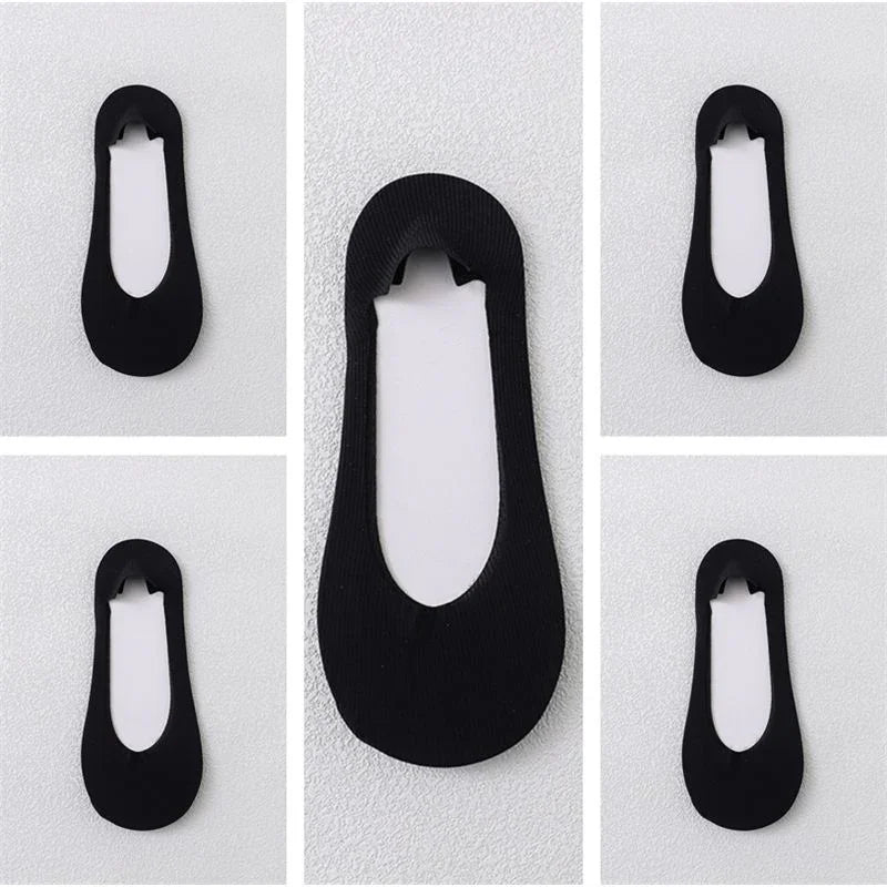 Black no-show liner socks displayed on white textured background in multiple angles