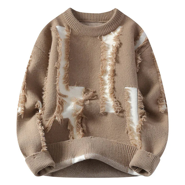 Beige wool knit sweater with distressed white patch detailing and ribbed cuffs and hem