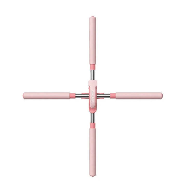 Pink adjustable leg stretcher for flexibility training on white background