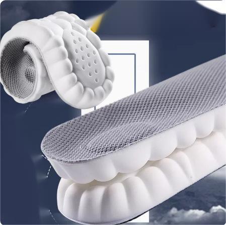 Soft gray and white cloud-shaped shoe insole with textured cushioning design