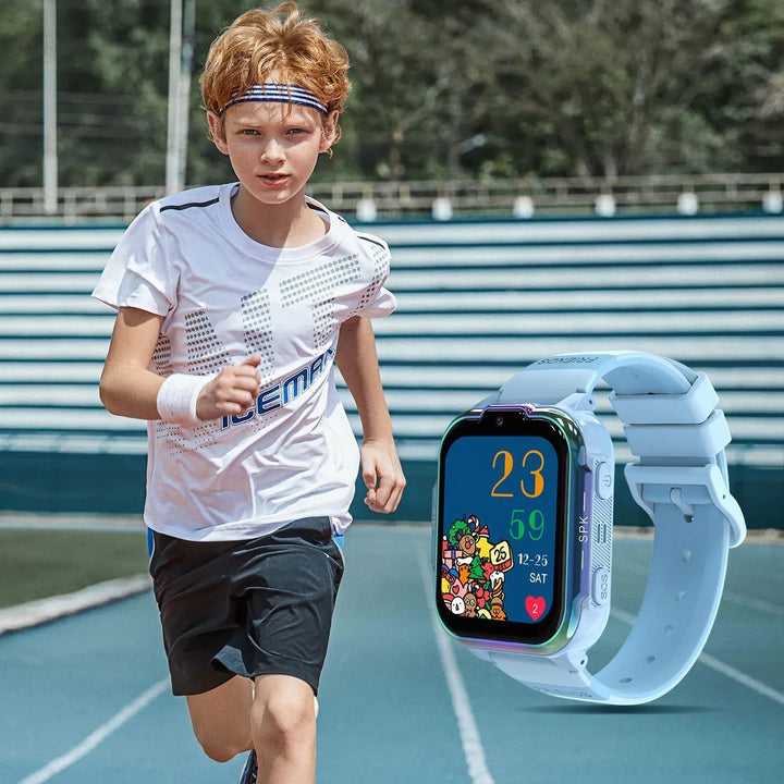 Young boy running on track wearing sportswear and blue kids smartwatch with colorful cartoon display