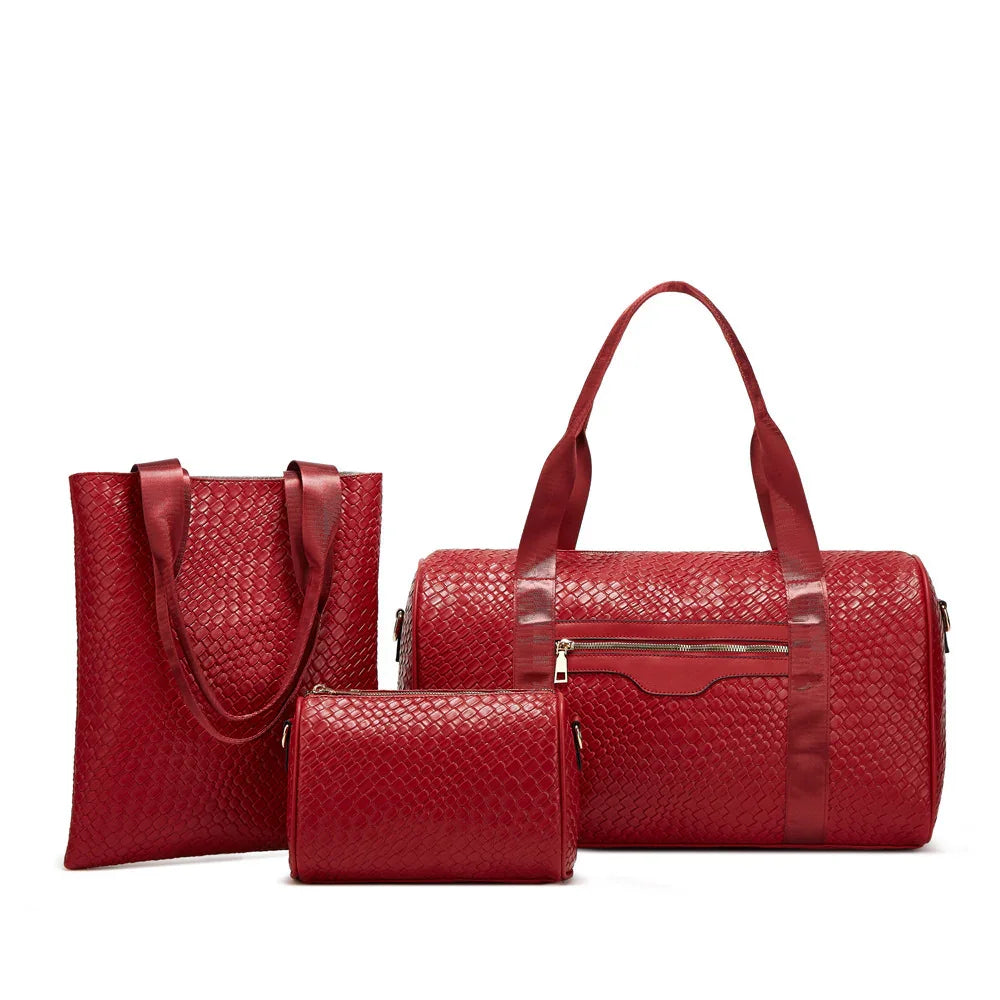 Set of three red woven leather bags including a tote, small rectangular purse, and duffle bag with handles