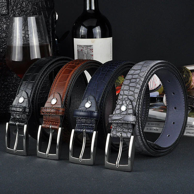 Set of four men's crocodile texture leather belts in black, brown, blue, and gray with metal buckles
