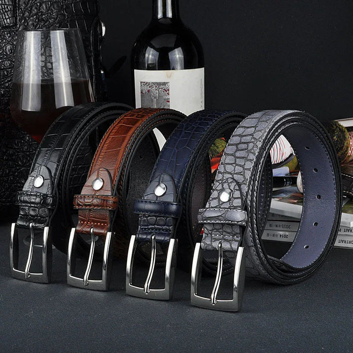 Set of four men's crocodile texture leather belts in black, brown, blue, and gray with metal buckles