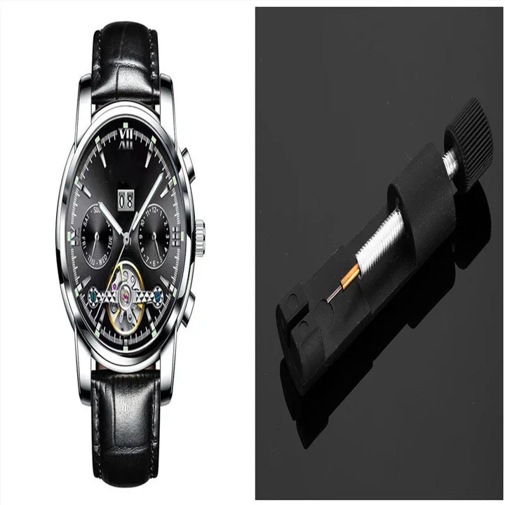 Luxury black leather strap wristwatch with silver case and mechanical movement, watch hand removing tool