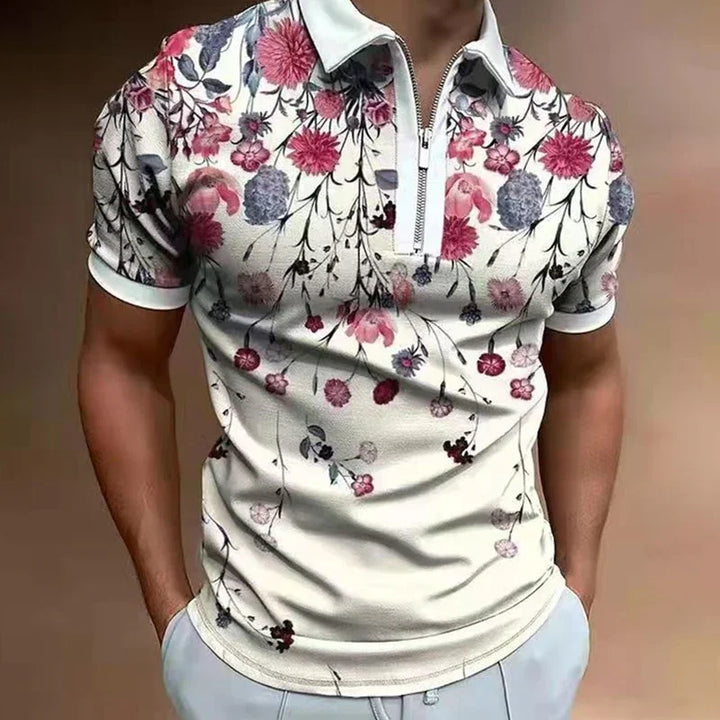 Men's white polo shirt with colorful pink and purple floral print and half zip collar