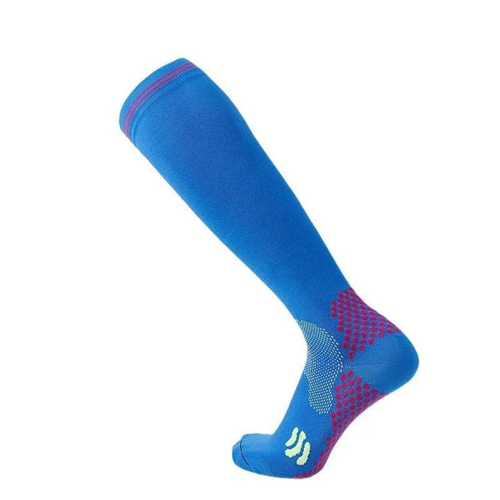 Blue knee-high compression sock with pink and white grip patterns on heel and sole