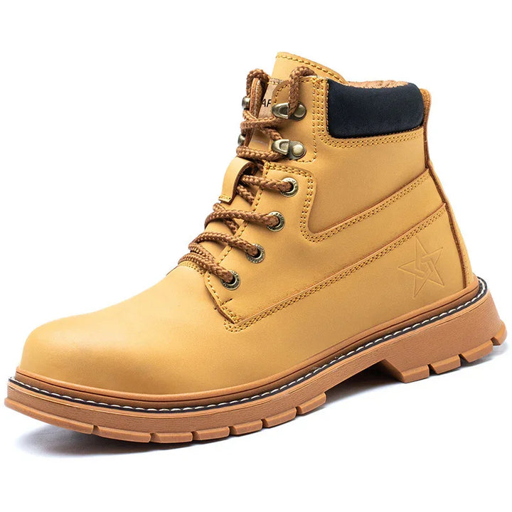 Tan work boot with padded black collar, brown laces, stitched sole, and embossed star logo