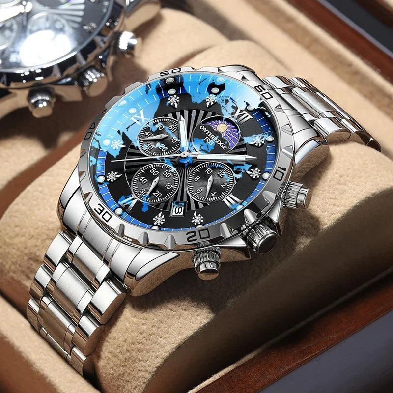 luxury silver stainless steel chronograph wristwatch with black dial and blue reflections in display box