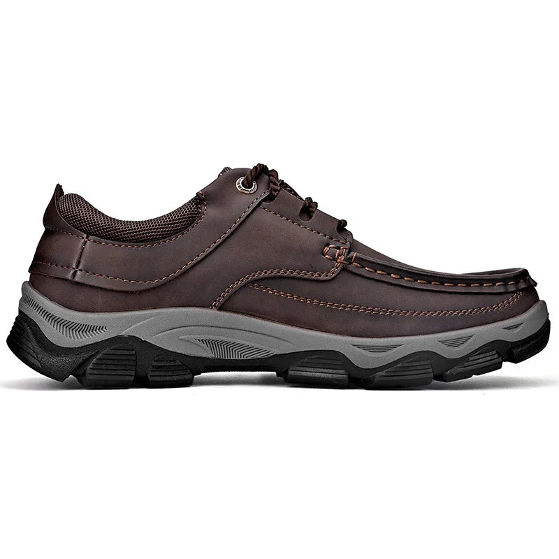 Brown leather casual men’s shoe with gray rugged rubber sole and lace-up design
