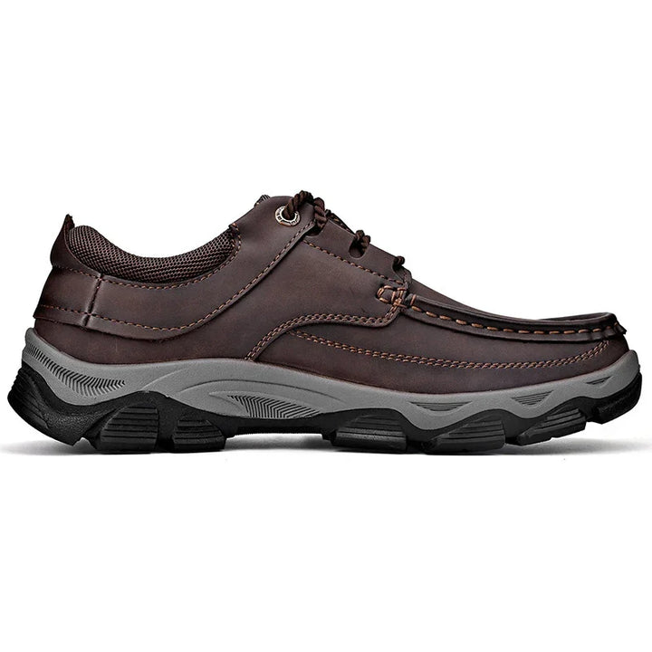 Brown leather casual men’s shoe with gray rugged rubber sole and lace-up design