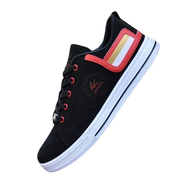Black casual sneaker with red eyelets, white and gold side stripes, and white sole with black line