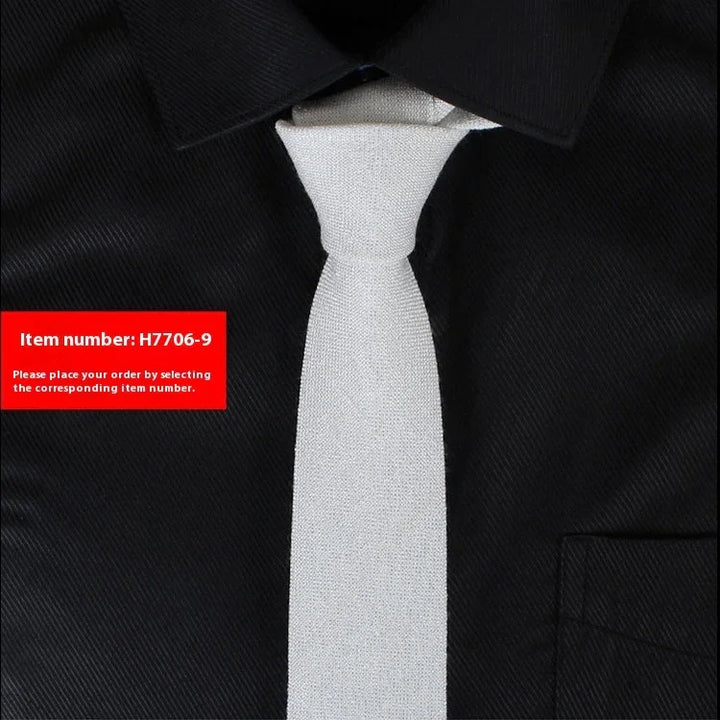 White slim tie on black dress shirt with collar and pocket, item number H7706-9 label