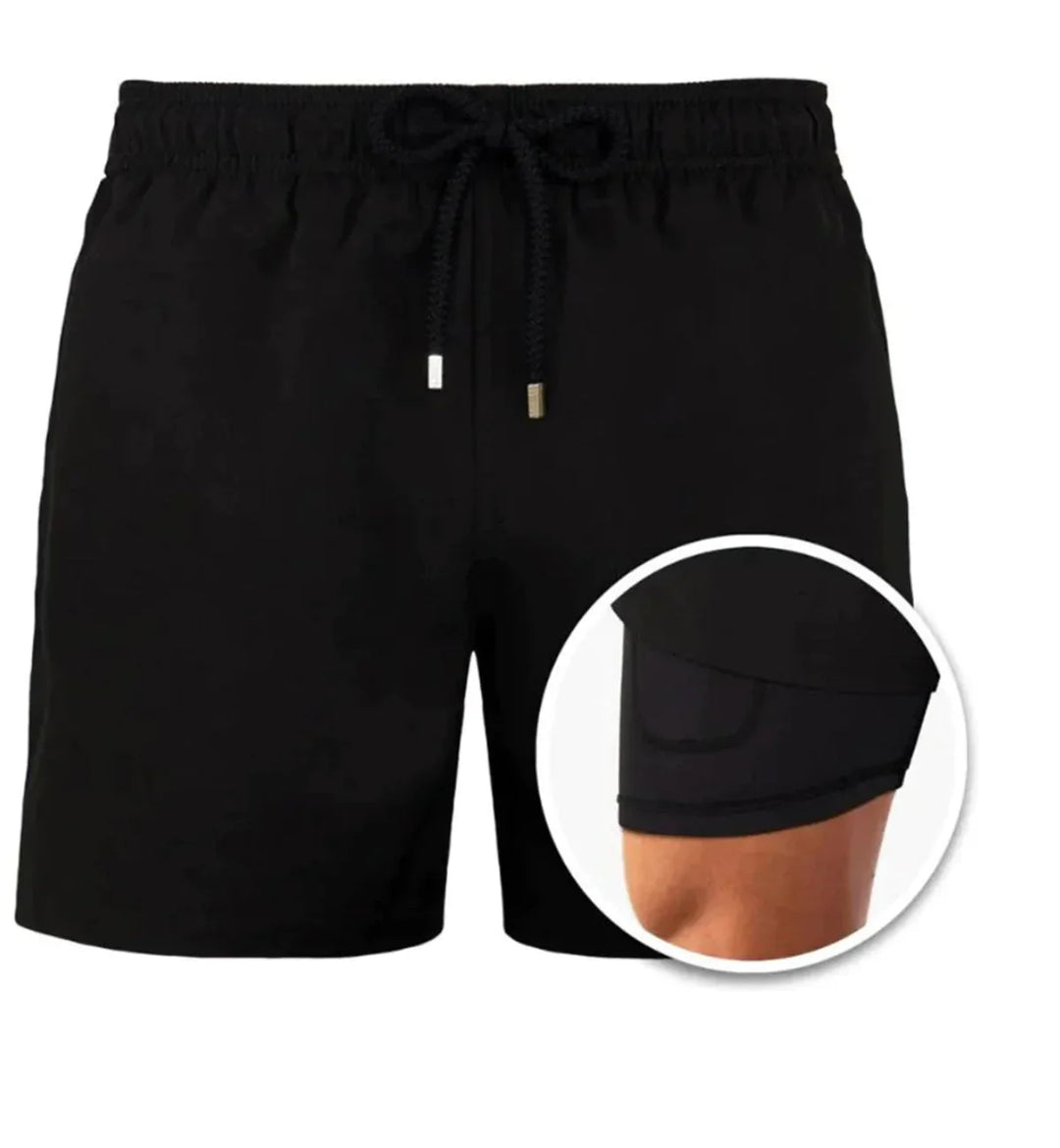 Black men's swim trunks with elastic waistband and drawstring, featuring built-in compression shorts