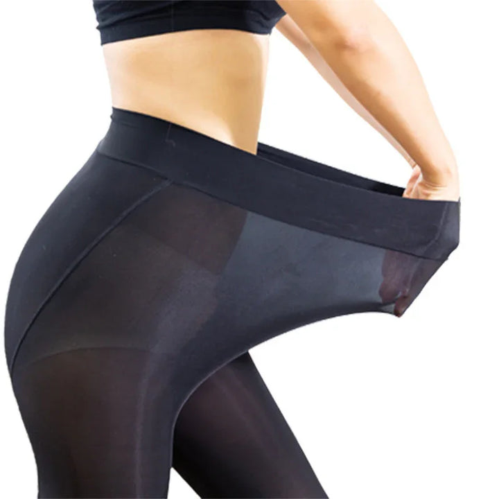 Woman wearing black high-waisted stretchy leggings, demonstrating flexible fabric fit