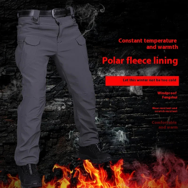Men's gray pants with belt and black boots, fire below, smoke effect, highlighting polar fleece lining and warmth