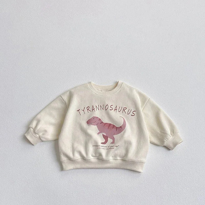 Cream toddler sweatshirt with pink Tyrannosaurus dinosaur graphic and text on front