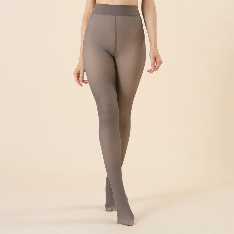 Woman wearing taupe seamless sheer tights against beige background