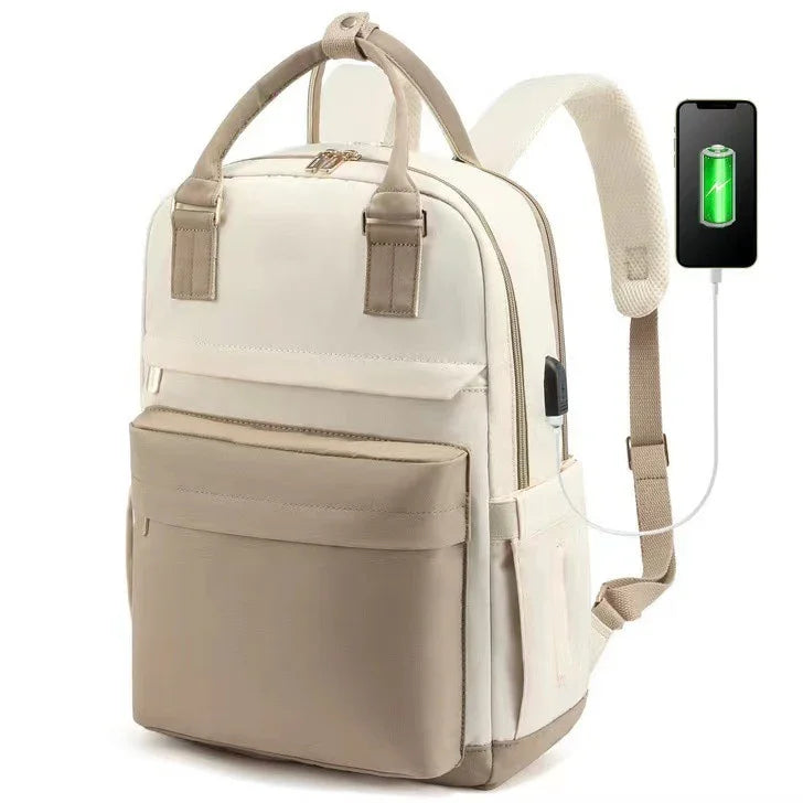 modern beige and cream backpack with USB charging port connected to a phone showing charging battery