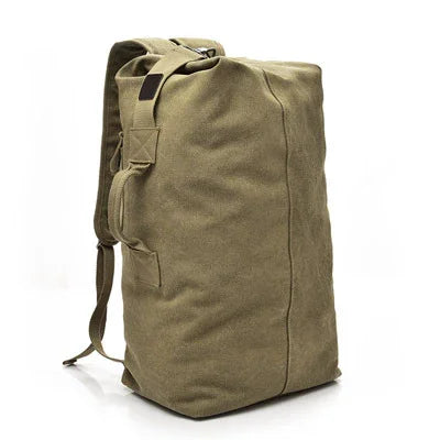 Large olive green canvas backpack with padded straps and top handle against white background