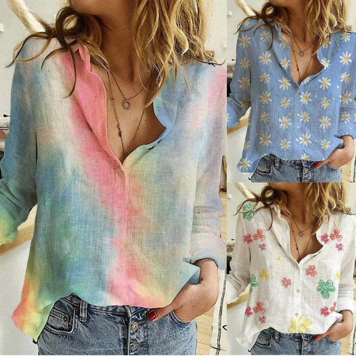 Women wearing casual button-up blouses with floral and tie-dye patterns paired with jeans