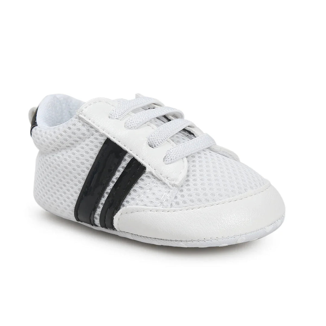 White baby sneaker with mesh upper and black side stripes on white background