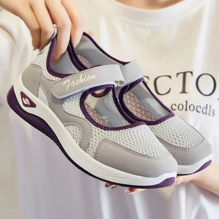 Light gray and purple breathable mesh casual sneakers with velcro strap labeled Fashion