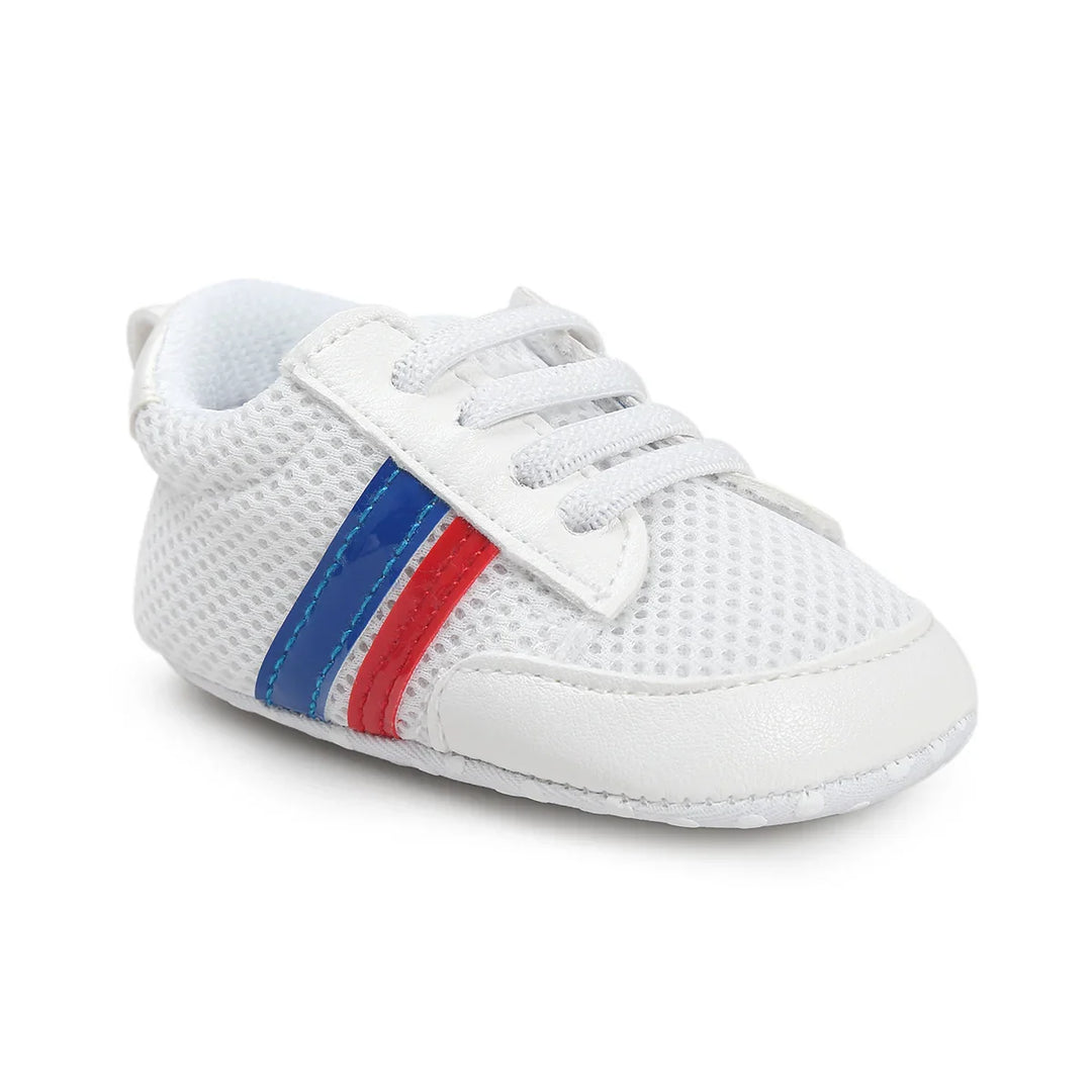 White baby sneaker with breathable mesh, blue and red side stripes, and lace-up design