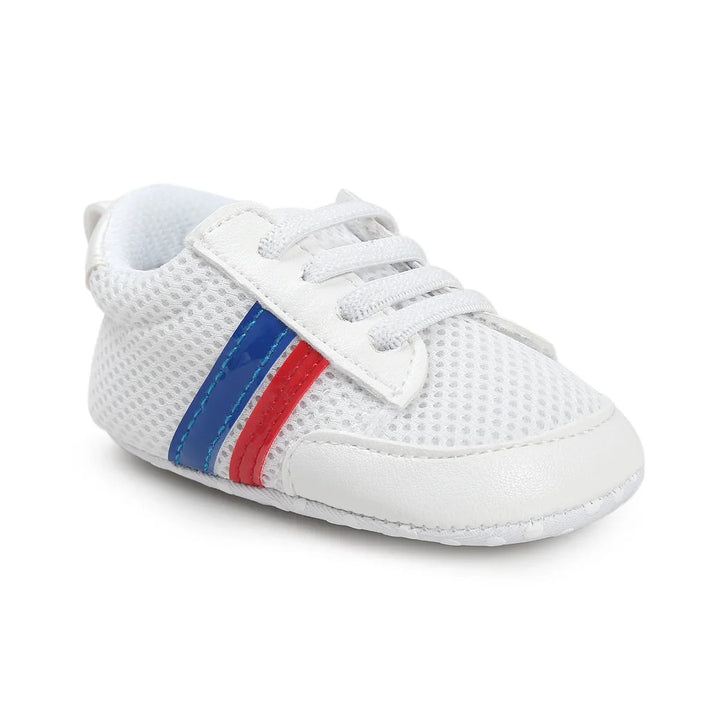 White baby sneaker with breathable mesh, blue and red side stripes, and lace-up design