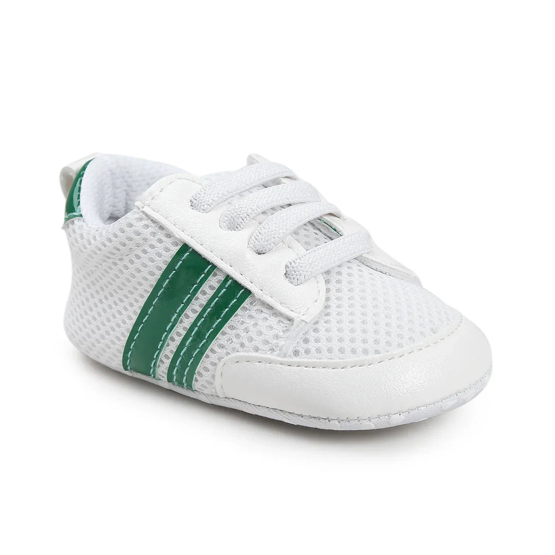 White baby sneaker with breathable mesh and green double stripes on side