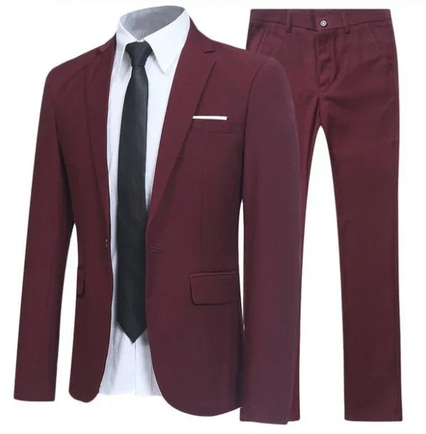 Men's burgundy formal suit with matching blazer and trousers, paired with white shirt and black tie