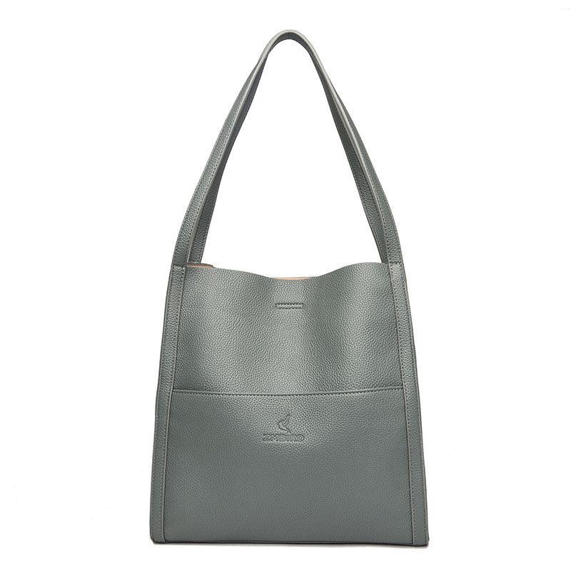 Gray pebbled leather shoulder tote bag with ZMBIRD logo and single long strap