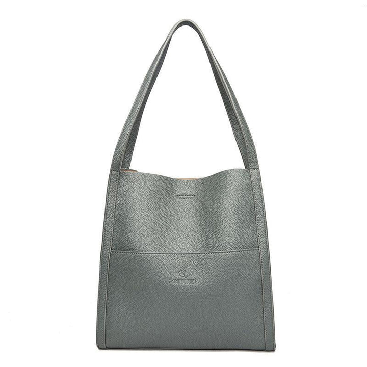 Gray pebbled leather shoulder tote bag with ZMBIRD logo and single long strap