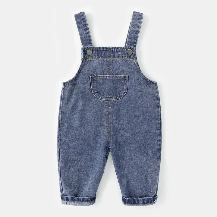 Blue denim baby overalls with front pocket and adjustable shoulder straps on white background