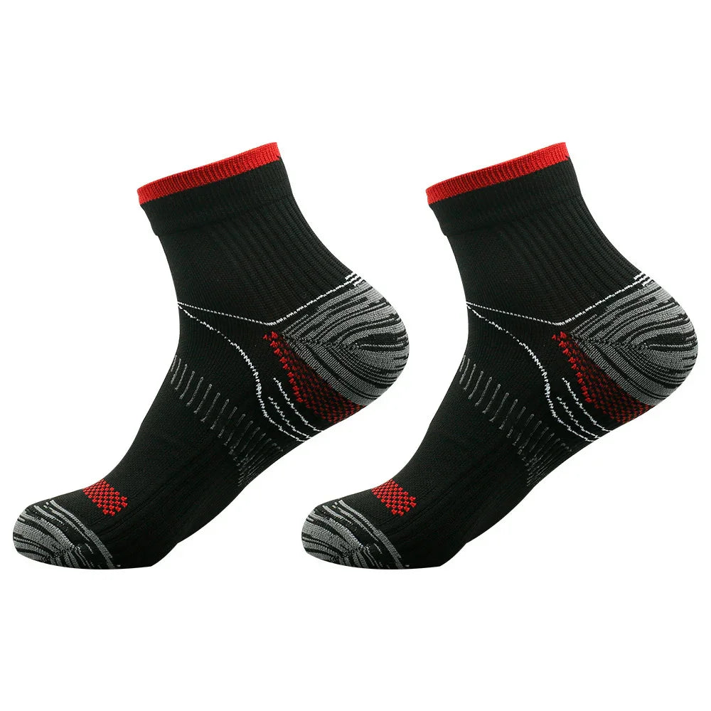 Pair of black athletic socks with red trim and grey reinforced heel and toe areas